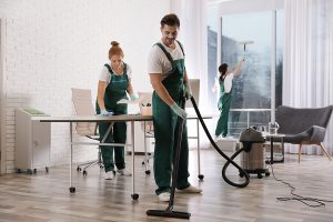 Team of professional janitors offering building cleans